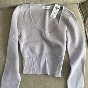 Soft sweater with scoop neck